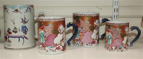 A graduated set of three Chinese export famille rose mugs and another larger, Qianlong period, 10cm-13cm and 16.5cm (4)